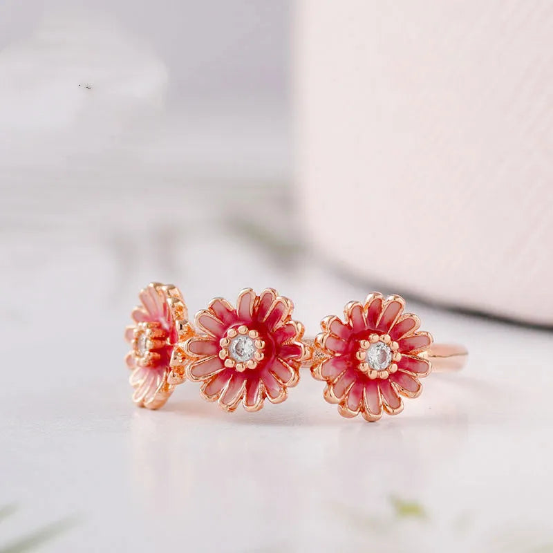Pink daisy ring in 925 sterling silver with micro-inlay gemstones, five sizes 50mm to 58mm.