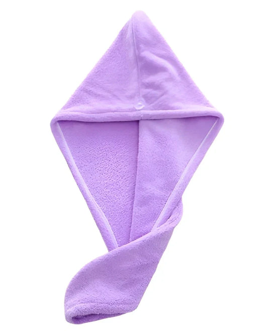 Pink microfiber hair drying towel measuring 25x65cm with button fastening shown wrapped around hair