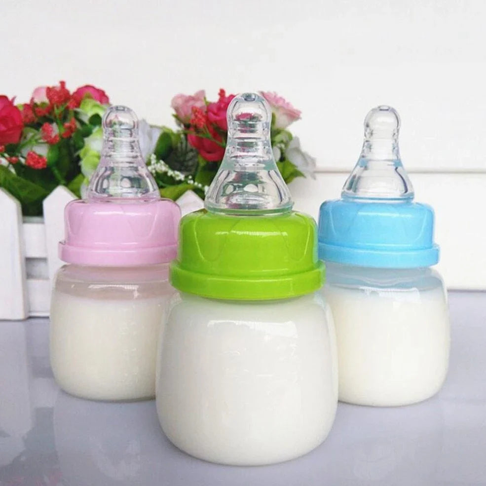 60ml infant feeding bottle with variable flow nipple in blue, green, or pink colour options