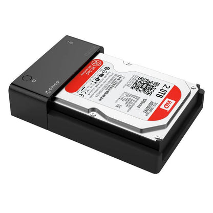 Black universal 2.5-inch SATA hard disk box with data cable for portable external storage