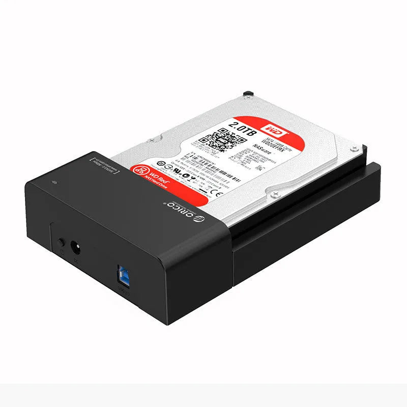 Black universal 2.5-inch SATA hard disk box with data cable for portable external storage