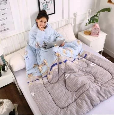 Cozy fleece blanket with sleeves in various colors, perfect for relaxing and enjoying indoor activities