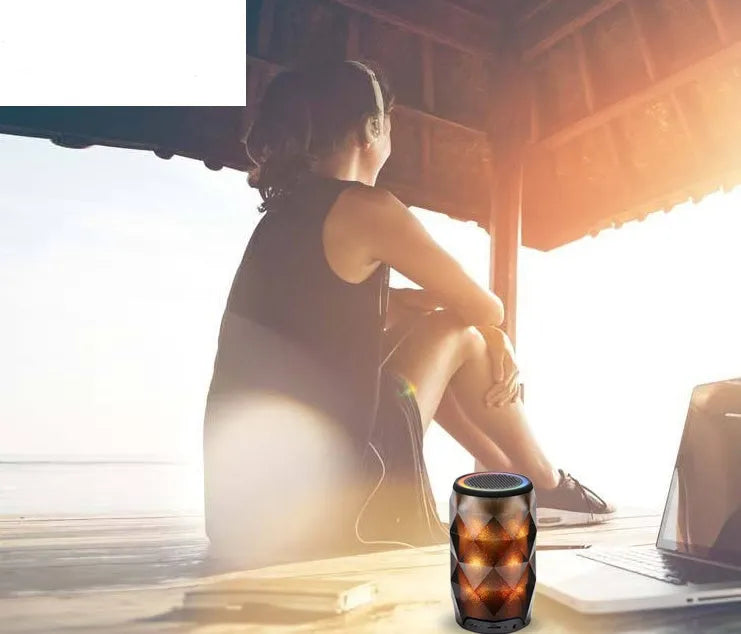 Black crystal diamond-cut Coke can shaped Bluetooth speaker with colourful starry sky LED lighting.