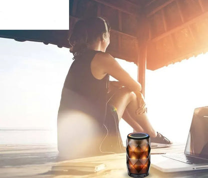 Black crystal diamond-cut Coke can shaped Bluetooth speaker with colourful starry sky LED lighting.
