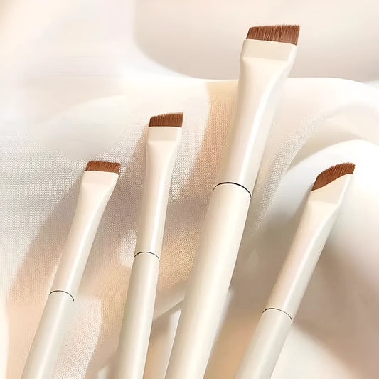 Four angled eyeliner and eyebrow brushes with ultra-thin tips in leather case