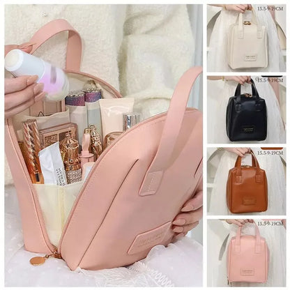 Shell-shaped waterproof PU leather cosmetic bag in various colors