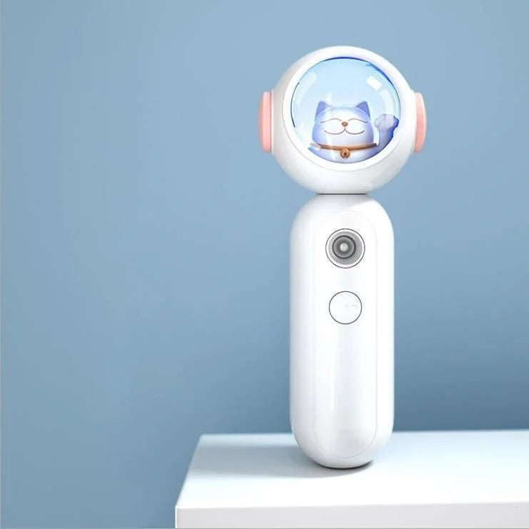 Handheld Nano Spray Steamer in cat pink, cat white, and alien red for portable skin hydration