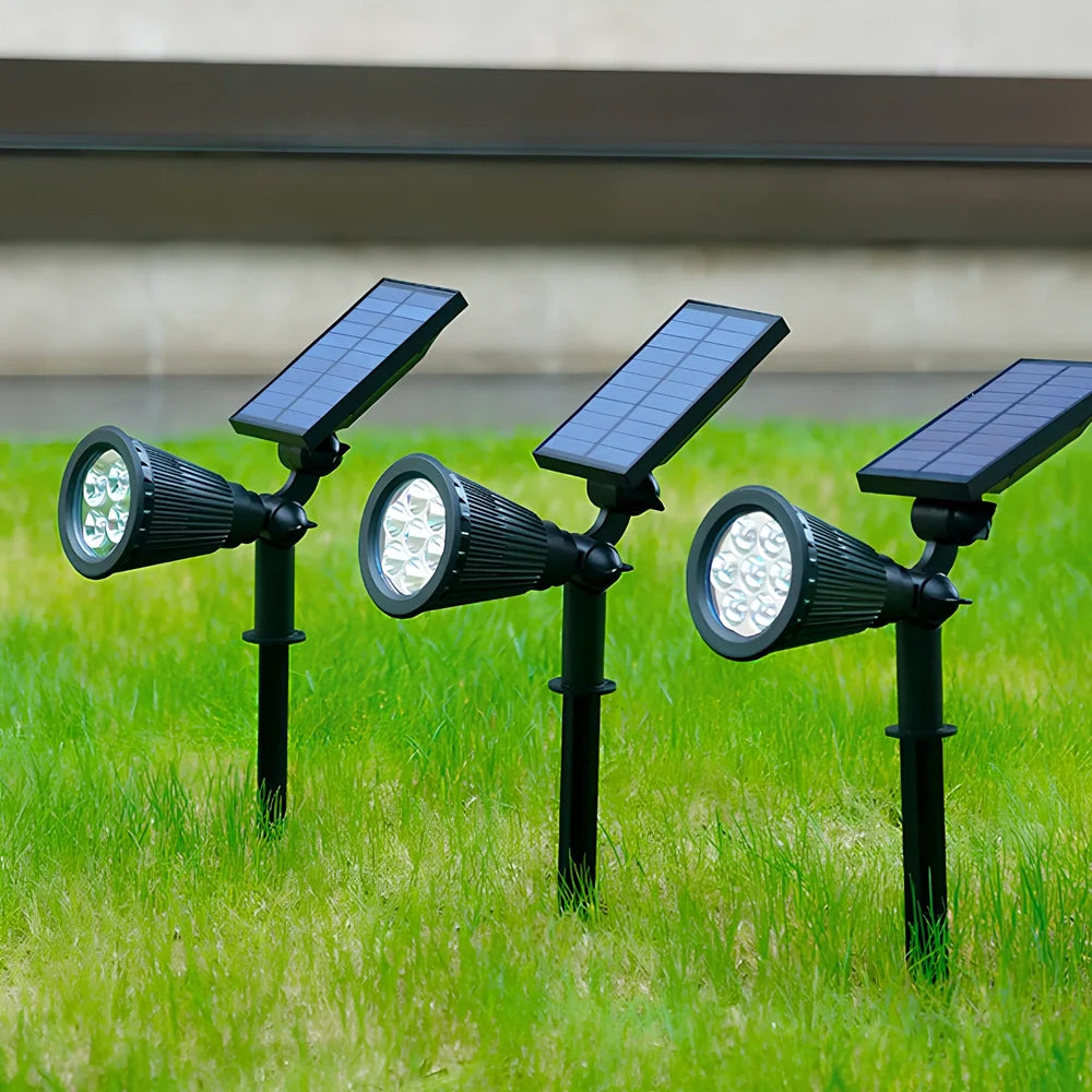 Solar lawn light with ground stake mounting, LED illumination, and waterproof housing for garden installation