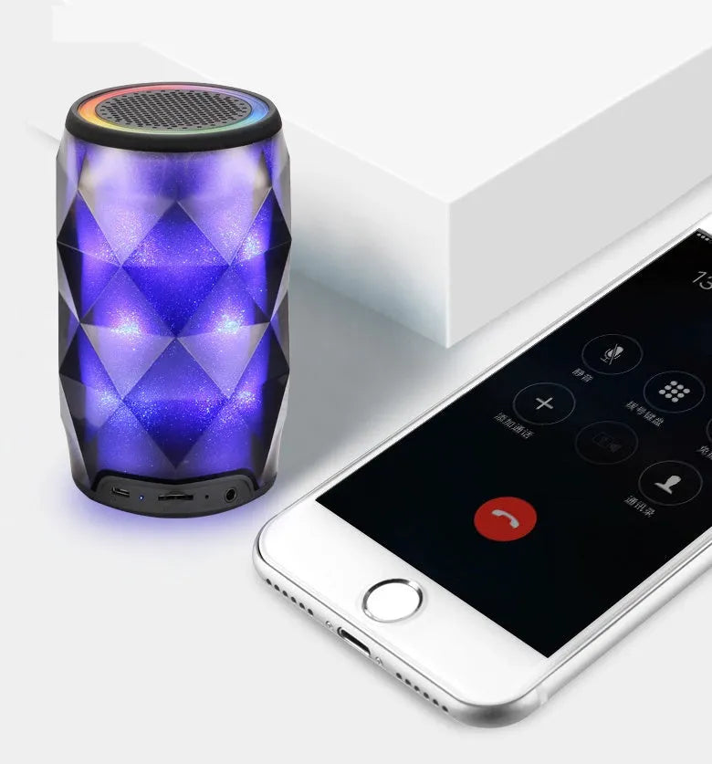 Black crystal diamond-cut Coke can shaped Bluetooth speaker with colourful starry sky LED lighting.