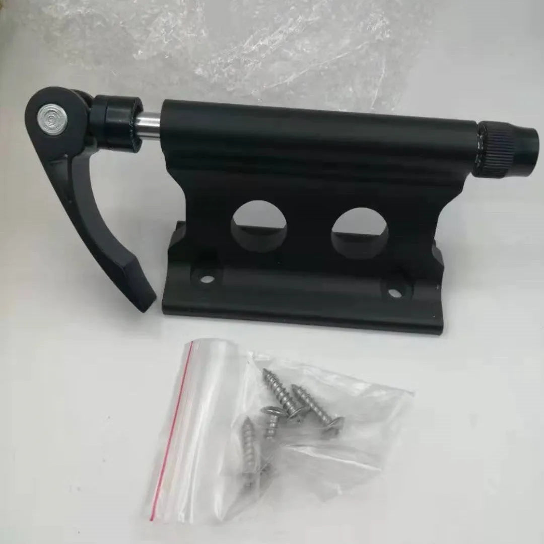 Silver metal quick-release clamp for attaching a bicycle front fork to a vehicle rack.