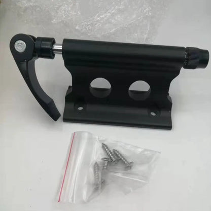 Silver metal quick-release clamp for attaching a bicycle front fork to a vehicle rack.