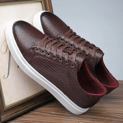 Men's black low-top business shoe with artificial PU leather upper and rubber sole.