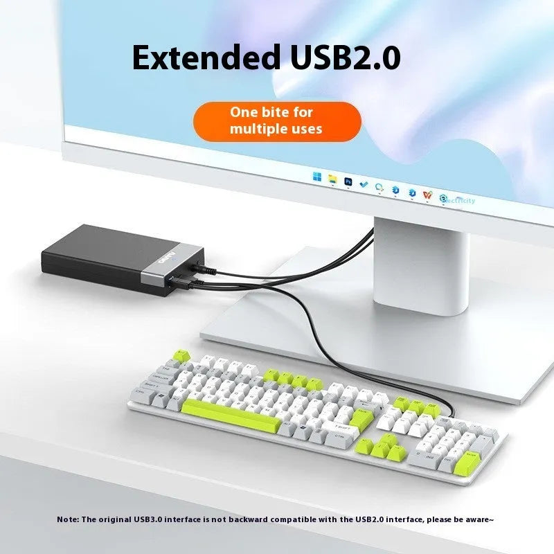 Black and silver 3.5-inch SATA hard disk enclosure with slide-open cover, USB 3.0 cable, and power adapter.