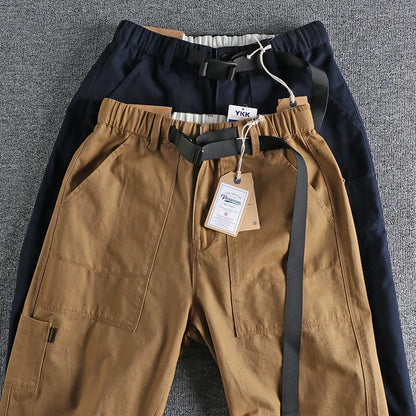 Men's khaki work trousers with N I buckle belt and three-dimensional cutting design