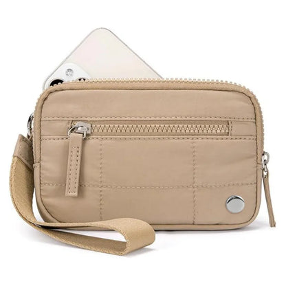 Waterproof quilted women's handbag with transparent deck in beige colour