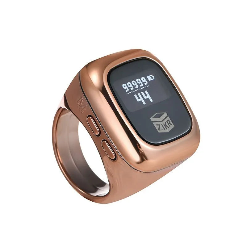 Al-Fatiha black electronic zikr counter on wrist showing digital display, with rose gold and silver colour options visible.