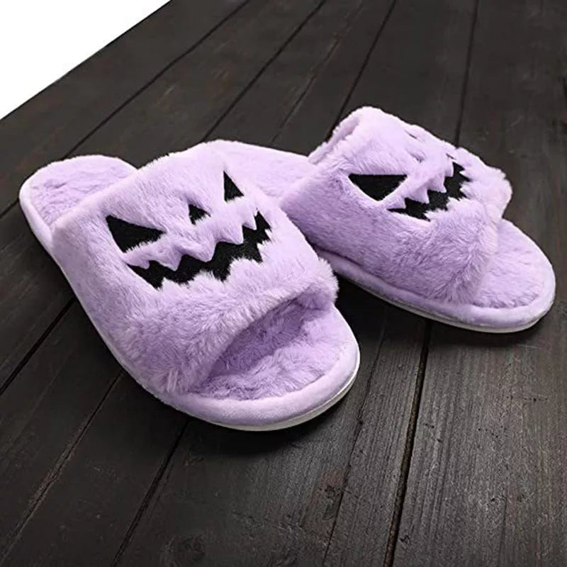 Women's Halloween winter slippers with rabbit fur uppers and PU soles in purple, black, pink, or orange.