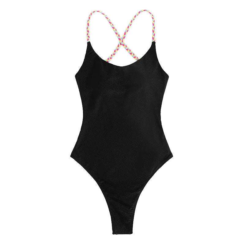Black women's one-piece backless nylon swimsuit on a hanger