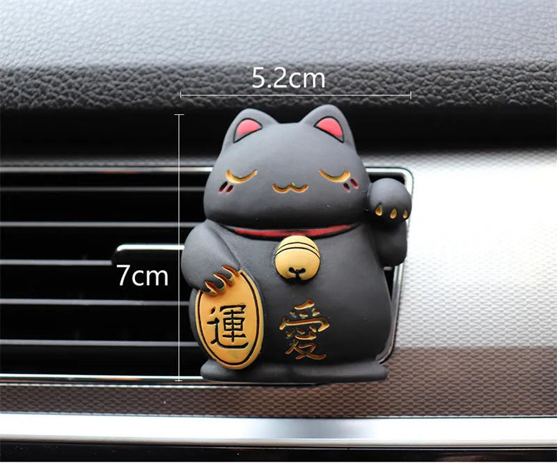 Resin cat-shaped car vent clip holding aromatherapy cotton for vehicle odour control