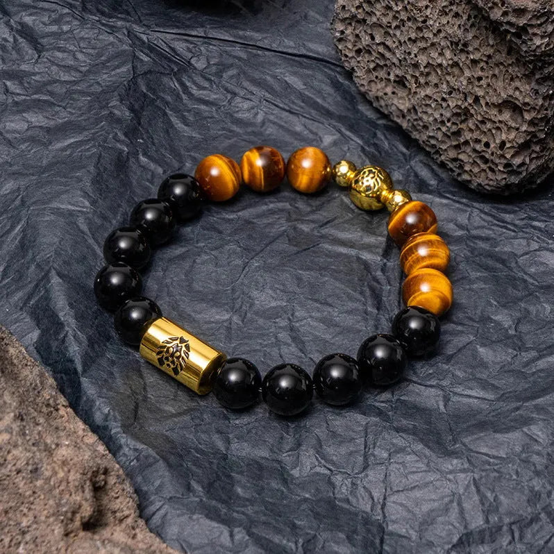 Black and white Qiankun bodhi seed ethnic bracelet with geometric shapes on wrist