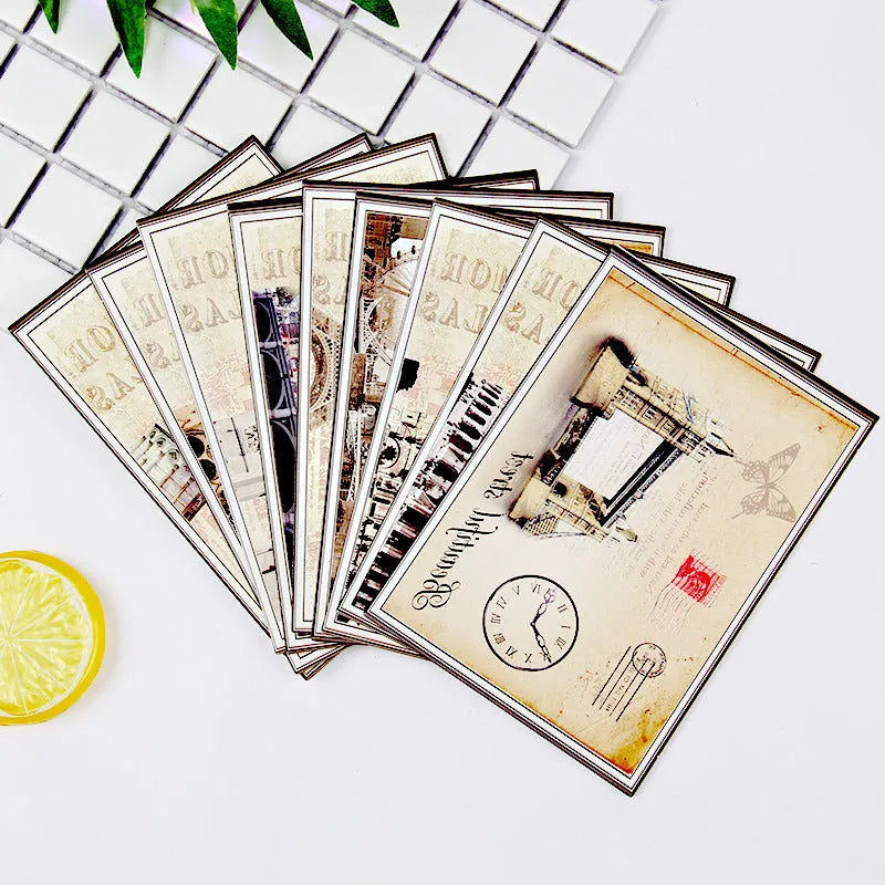 Pack of nine retro cartoon-style postcards showing Paris Eiffel Tower and historic site designs.