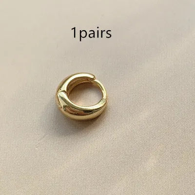 Women's retro minimalist water drop earrings in geometric round shape available in gold or silver colour with three size options