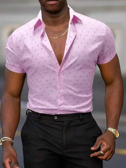 Man wearing a light blue short-sleeved floral print shirt with a casual cardigan style.