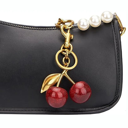 Zinc alloy key ring pendant charm in red or pink with three-dimensional design.