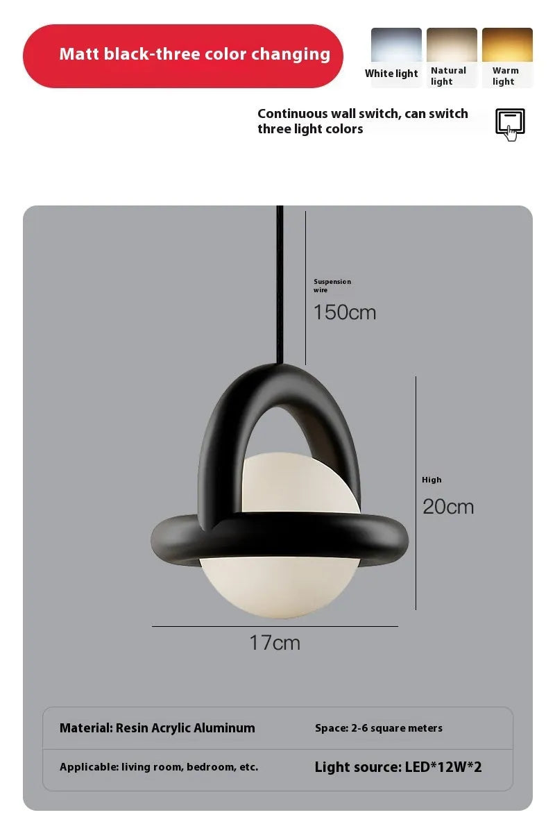 Danish designer hanging line lamp with adjustable cord and matte finish in bedside setting