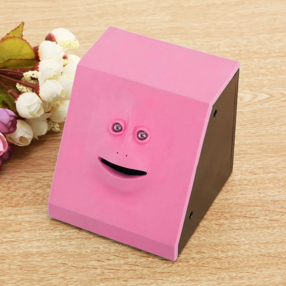 Face Intelligent Induction Electric Piggy Bank with realistic money-eating action in brick blue, pink, or red