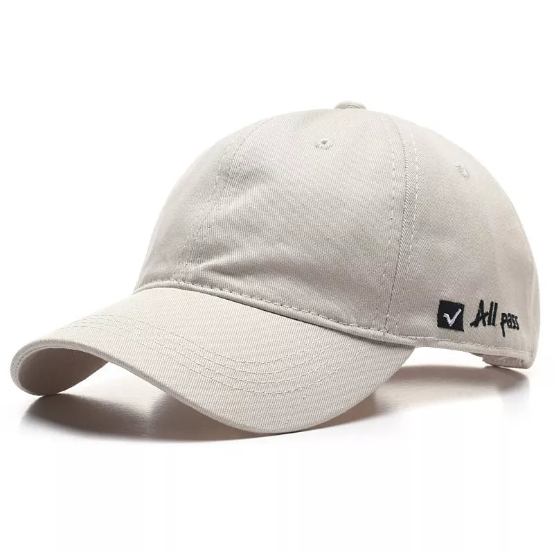 Adjustable cotton baseball cap with side letter embroidery in multiple colors