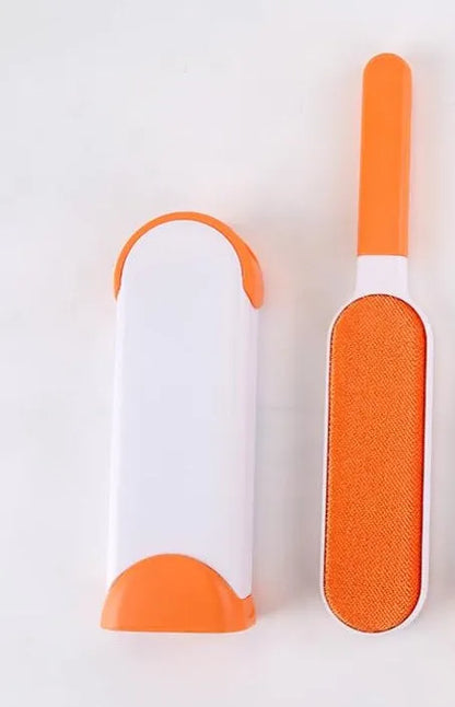Blue reusable pet hair removal comb with sticky brush and self-cleaning base for sofas.