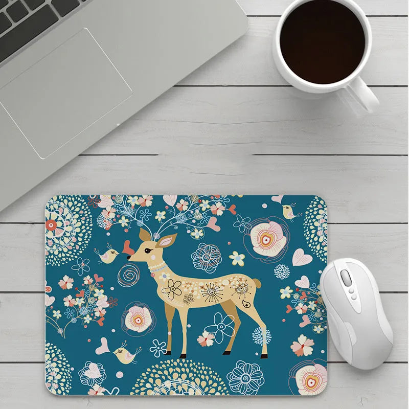 Customisable thick cartoon mouse pad with non-slip base, showing sample patterns like strawberry, cat, and whale designs.