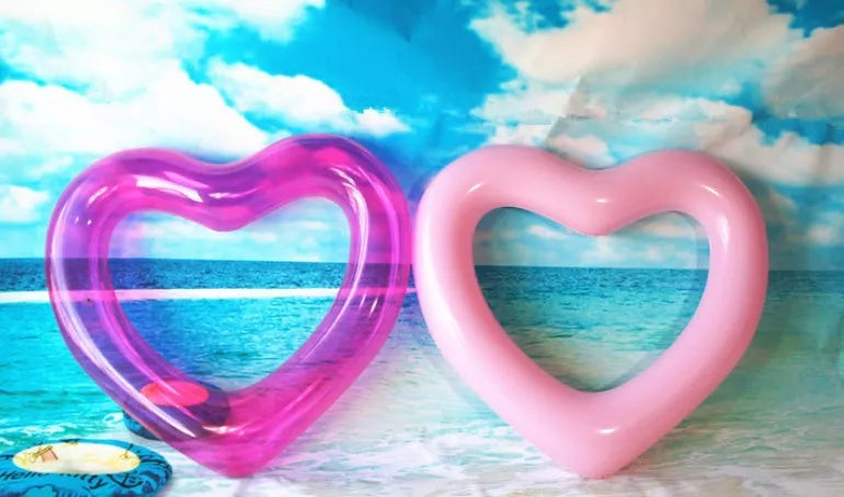 Oversized 120cm heart-shaped swim ring for adults in vibrant colors