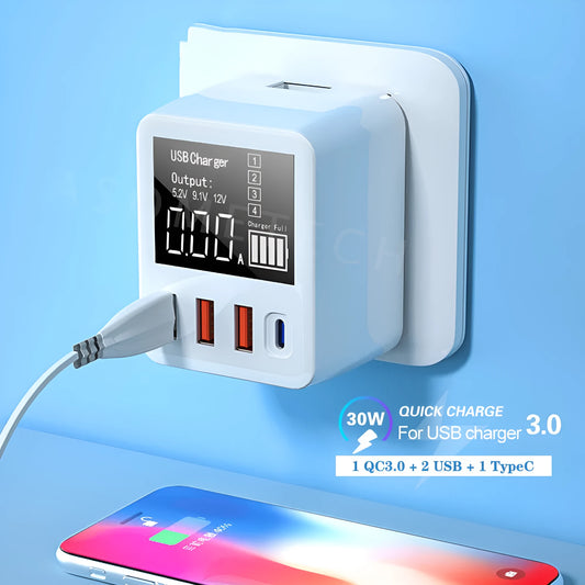 White 4-port travel charger with LED display showing UK plug configuration