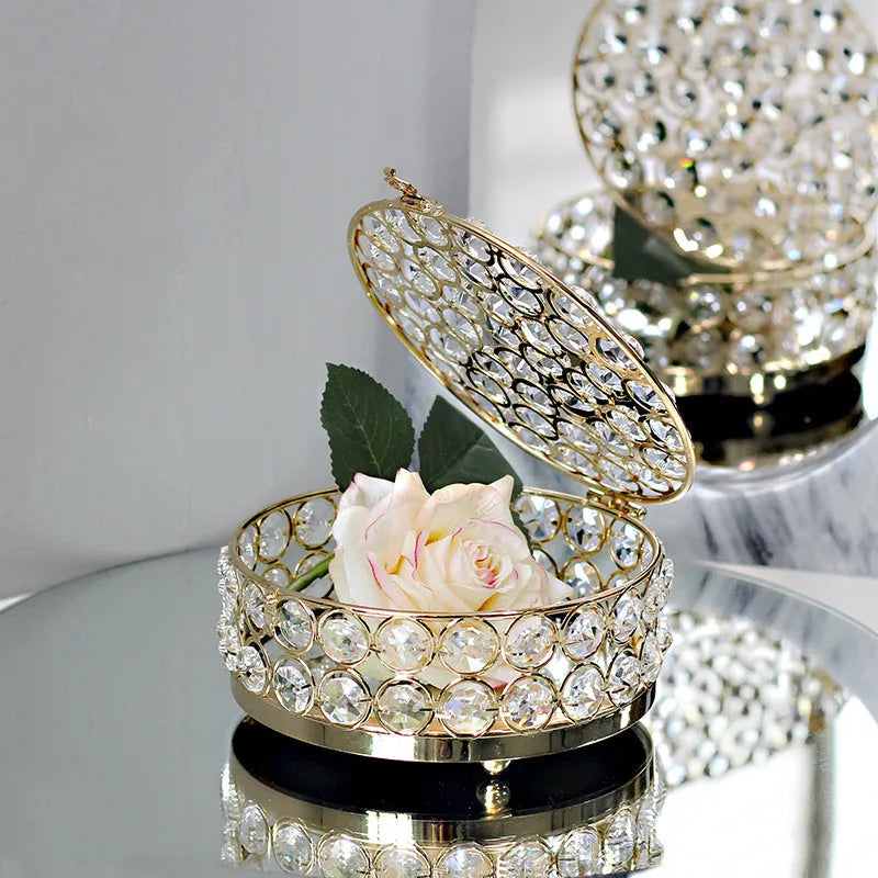 French gold iron jewellery box with crystal glass panels showing jewellery inside