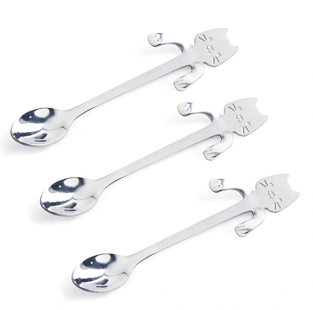 Stainless steel coffee spoon with cartoon cat handle design showing 11.7cm measurement scale