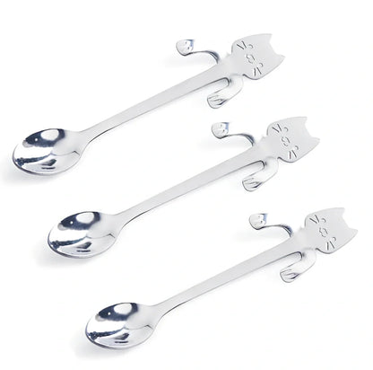 Stainless steel coffee spoon with cartoon cat handle design showing 11.7cm measurement scale
