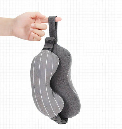 Dark grey two-in-one pillow showing neck support position and eye mask function with 24cm length measurement
