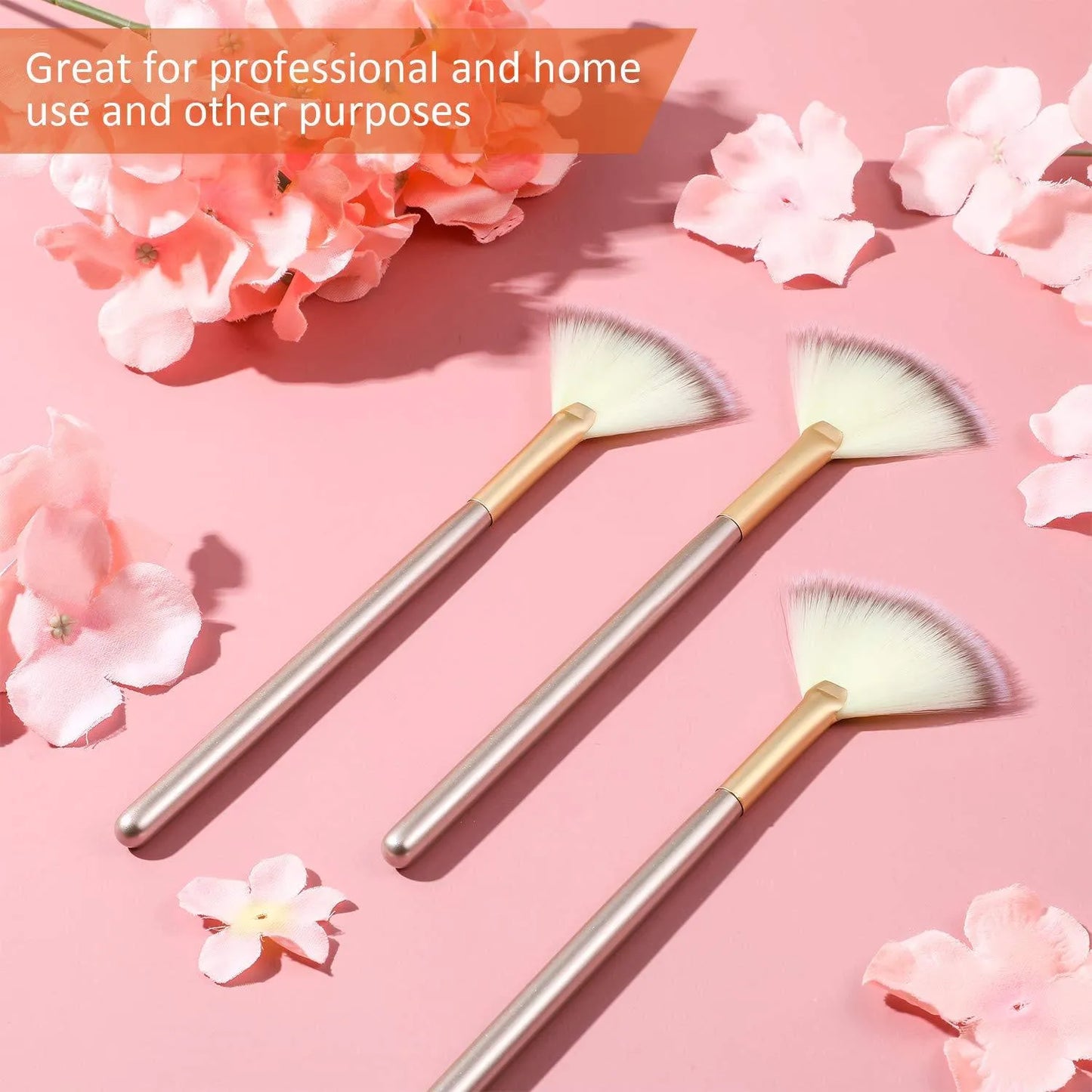 Ten soft fibre facial fan brushes with champagne finish acrylic handles and brush covers.