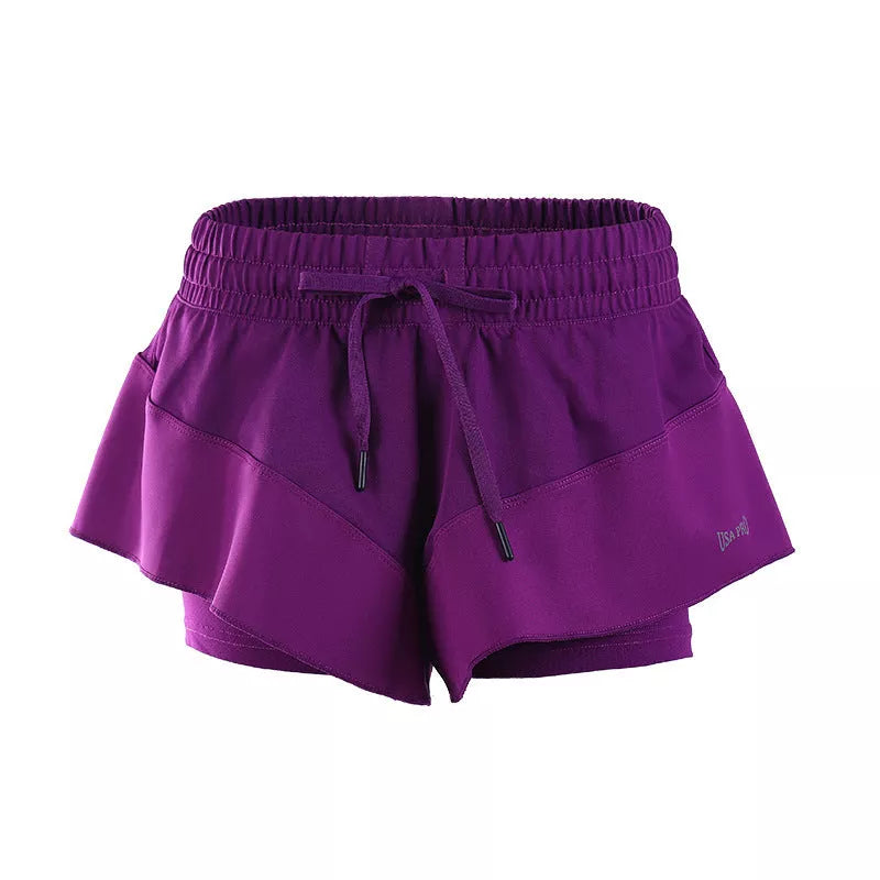 Quick-drying nylon athletic shorts in purple, available in sizes S to XL