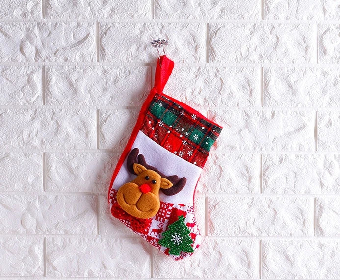 Festive Christmas socks with vibrant ornament designs in various styles, including elk, bear, elderly, and snowman patterns.
