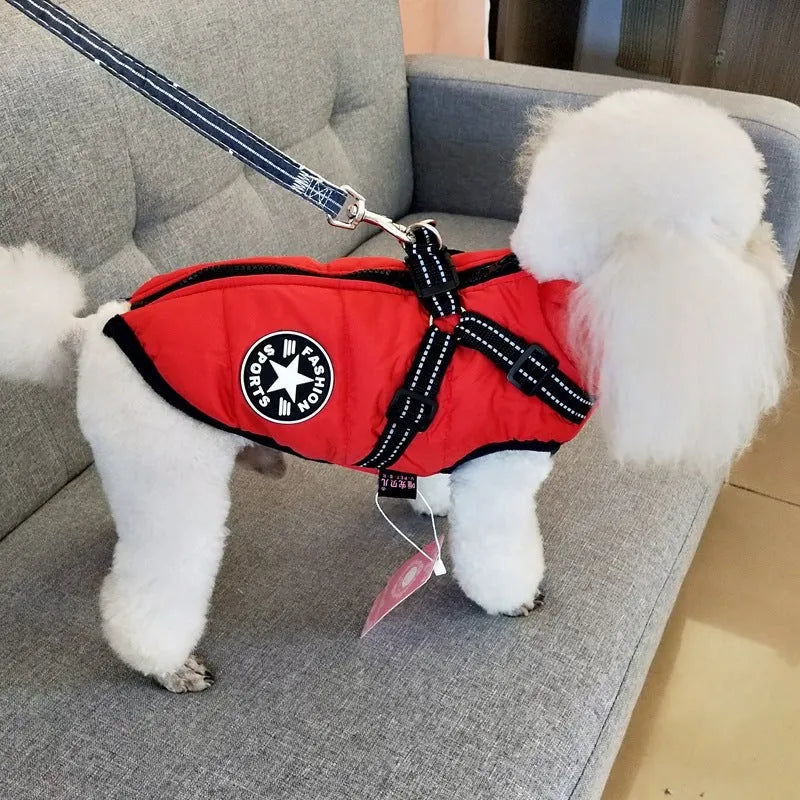 Waterproof dog coat with integrated harness in red colour, sized for medium dog breeds
