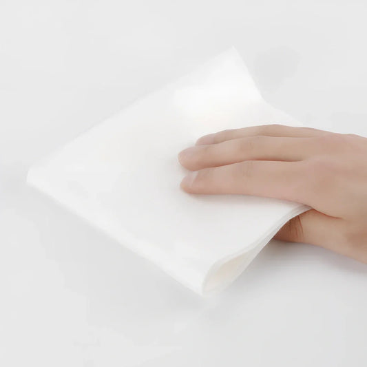 Roll of reusable bamboo paper towels showing thick fibre texture and sustainable packaging