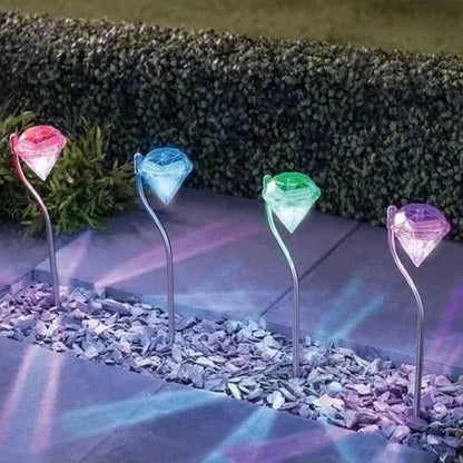 Solar powered garden diamond light with adjustable angle and IP55 waterproof rating for outdoor use