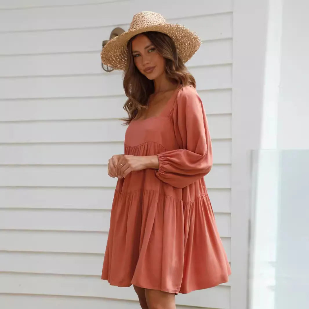Children's solid colour dress with square collar, puff sleeves, backless design, and A-line skirt in orange or light blue