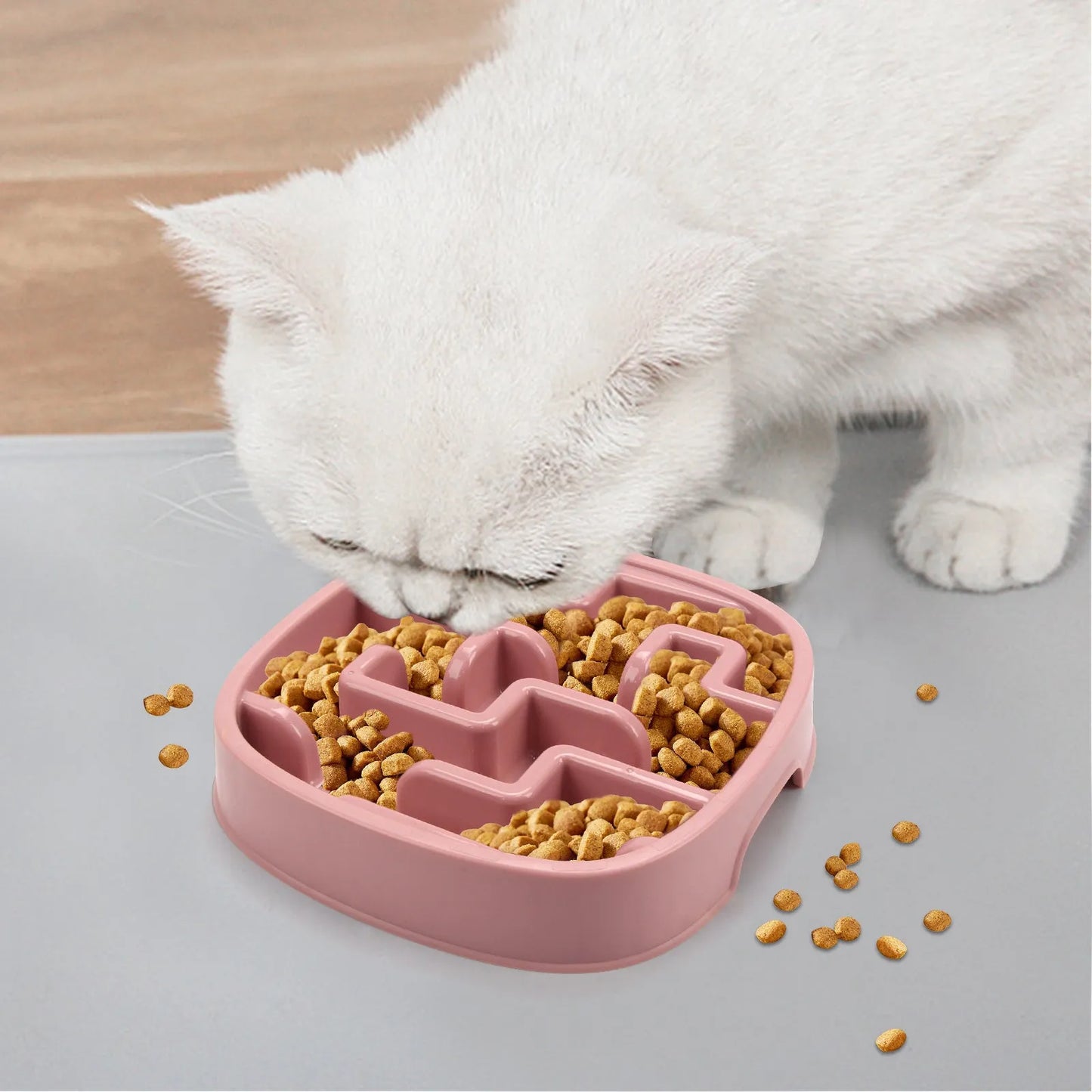Macaron-coloured slow feed pet bowl with maze pattern and non-slip base for dogs and cats.