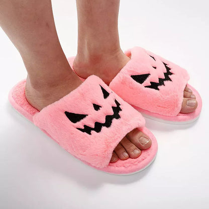 Women's Halloween winter slippers with rabbit fur uppers and PU soles in purple, black, pink, or orange.