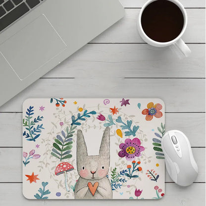 Customisable thick cartoon mouse pad with non-slip base, showing sample patterns like strawberry, cat, and whale designs.