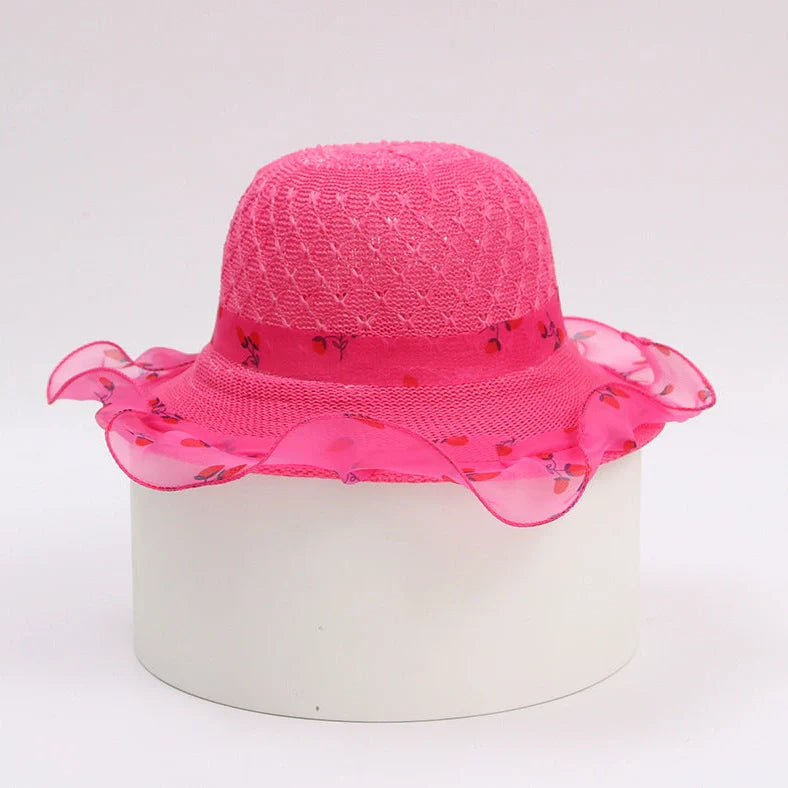 Children's princess straw hat with floral accents and wide brim for sun protection